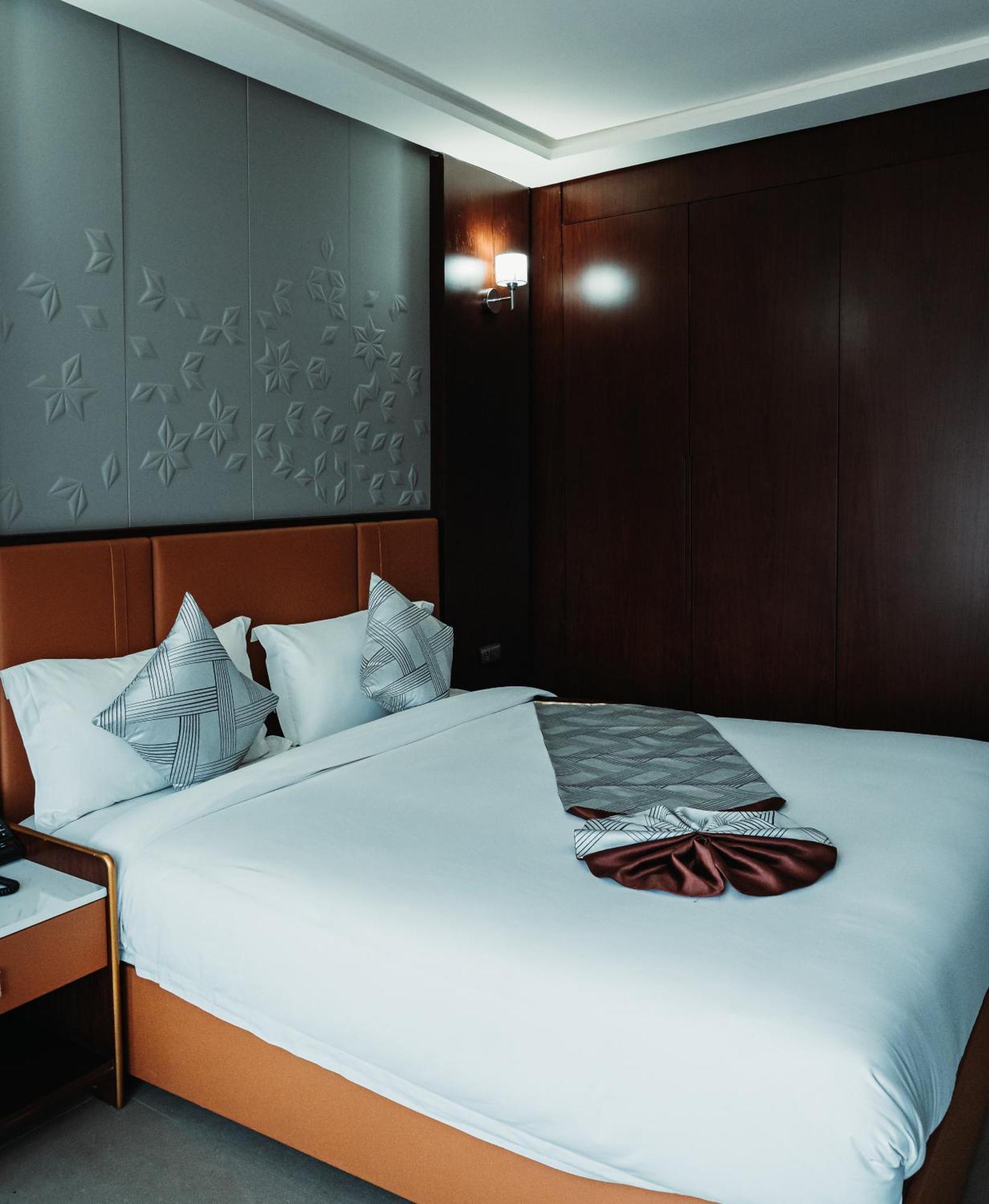 Waves Aqua Resort Kenitra Zewnętrze zdjęcie A bed in a hotel room